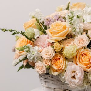 A full view of the luxury "Soft Serenade" flower basket, highlighting its elegant and soft pastel colors.