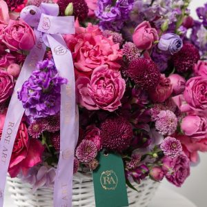 A full view of the luxury "Art of Purple" basket, highlighting its elegant mix of blooms.