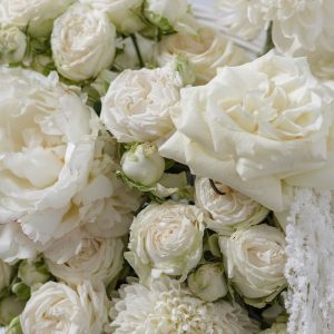 A close-up view of the luxury "Art of White" floral basket, highlighting the clean, modern look of the blooms.
