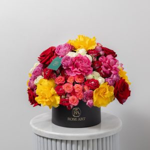 A stunning box arrangement of fresh, premium Armenian roses in a variety of vibrant colors.