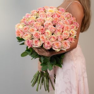 A stunning bunch of fresh, two-tone yellow and pink roses.
