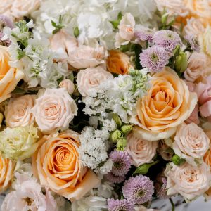 A top-down view of the Soft Serenade basket, highlighting its harmonious mix of blooms.