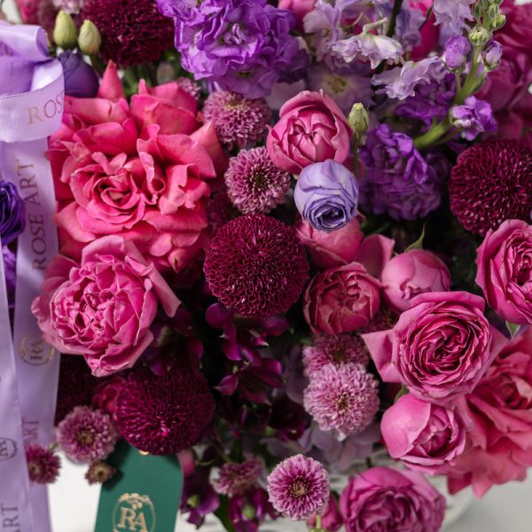 A top-down view of the Art of Purple basket, highlighting its vibrant mix of blooms.