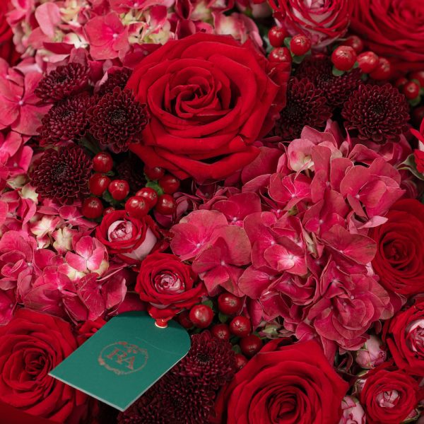 A top-down view of the Red Classic bouquet, highlighting its rich textures and classic composition.