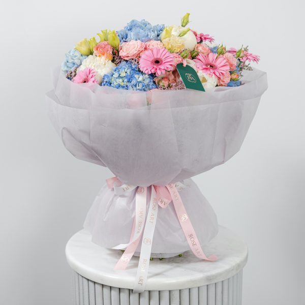 A full view of the luxury "Cotton Candy" bouquet, highlighting its playful mix of colors.