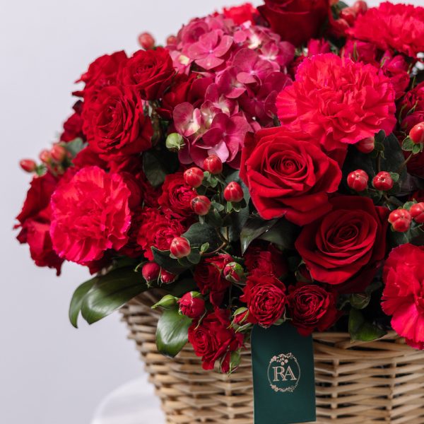 A close-up side view of the Red Classic basket, showing the detail of the various blooms.